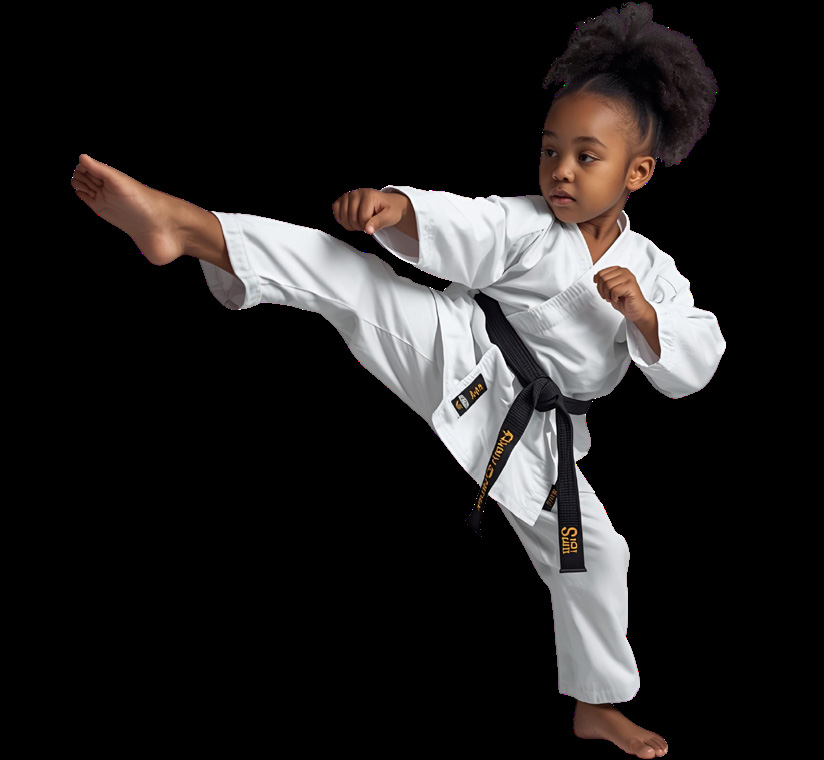 A child in a white martial arts uniform performing a high kick