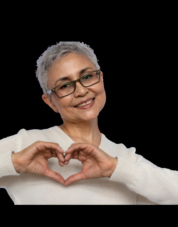 Smiling woman making heart shape