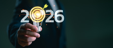 2026 Forecast Graphic showing a hand holding a lightbulb with a target