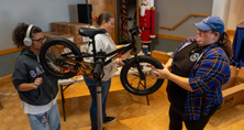 Members of Local 12 assembling bicycles during the Build-a-Bike charity event