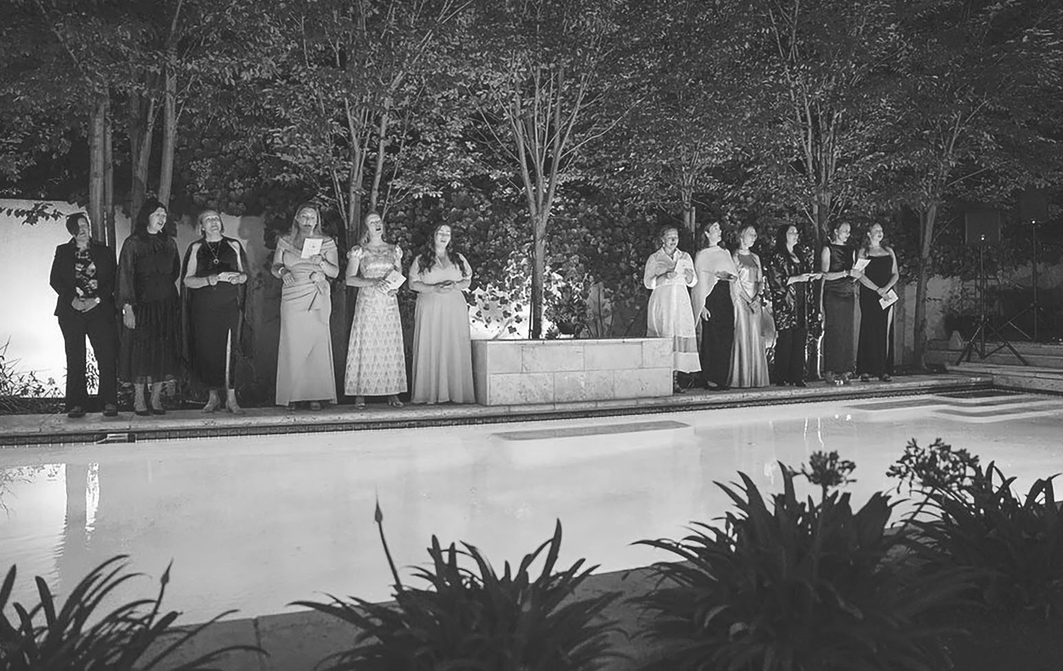 The Pellava Choir singing outdoors at the 70th anniversary celebration