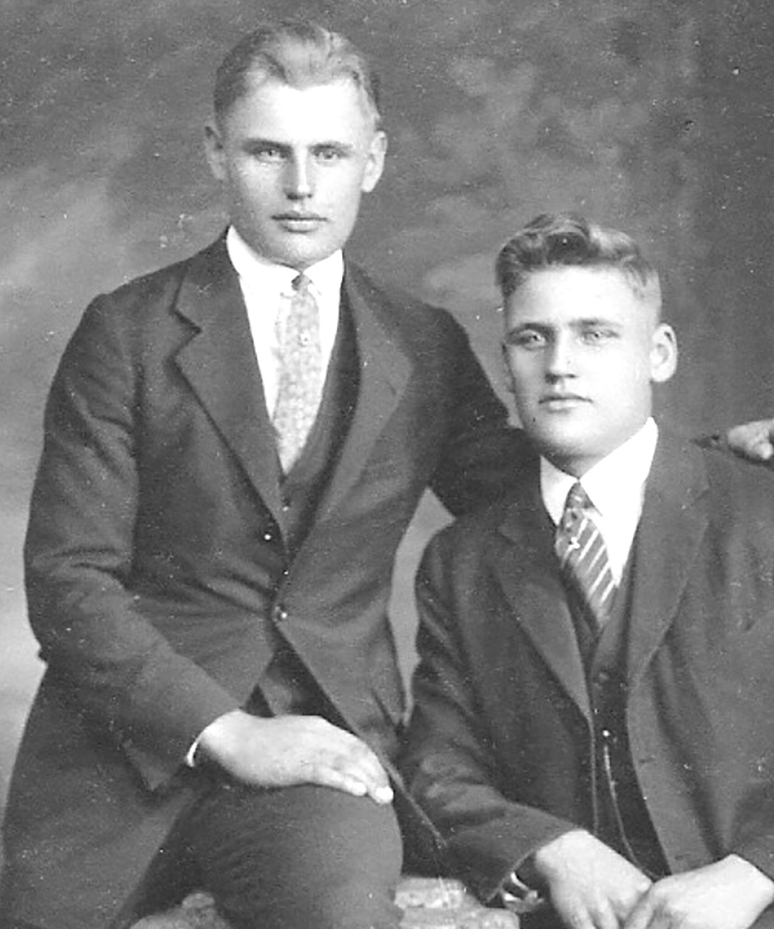 Black-and-white portrait of two young men, identified as Brothers Lillvik and Johnson.